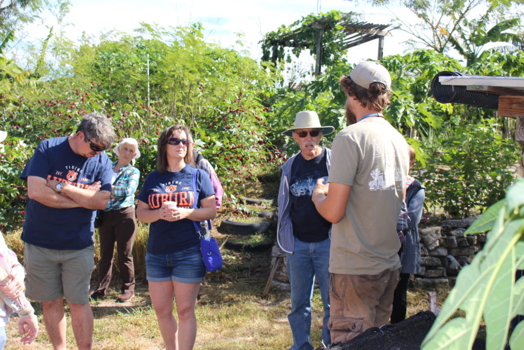 Josh Jamison gives a tour to Garden Celebration attendees.